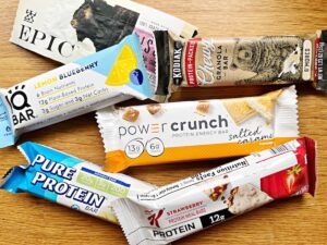 Image shows a pile of common protein bars